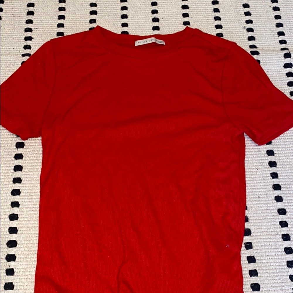 a red plain cropped shirt!